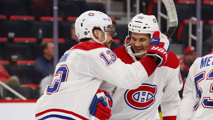 DETROIT, MICHIGAN - FEBRUARY 26: Andrew Shaw #65 of the Montreal Canadiens celebrates his third period goal and hat trick with Max Domi #13 while playing the Detroit Red Wings at Little Caesars Arena on February 26, 2019 in Detroit, Michigan. (Photo by Gregory Shamus/Getty Images)