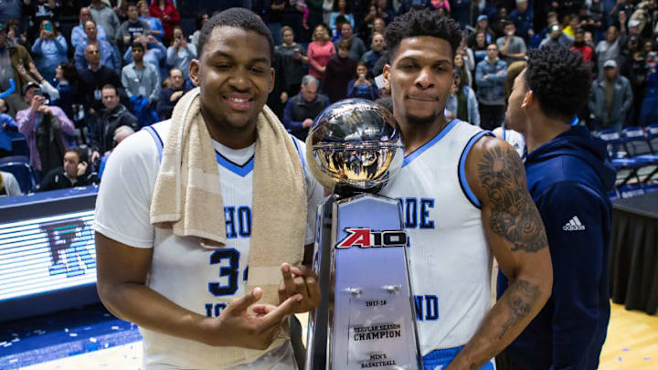 KINGSTON, RI - FEBRUARY 23: Rhode Island Rams forward Andre Berry (34) and Rhode Island Rams forward Ryan Preston (5) pose with the trophy at the conclusion of the college basketball game between Dayton Flyers and Rhode Island Rams on February 23, 2018, at the Ryan Center in Kingston, RI. Rhode Island defeated Dayton 81-56 and wins the Atlantic 10 regular season title. (Photo by M. Anthony Nesmith/Icon Sportswire via Getty Images) KINGSTON, RI - FEBRUARY 23: Rhode Island Rams forward Andre Berry (34) and Rhode Island Rams forward Ryan Preston (5) pose with the trophy at the conclusion of the college basketball game between Dayton Flyers and Rhode Island Rams on February 23, 2018, at the Ryan Center in Kingston, RI. Rhode Island defeated Dayton 81-56 and wins the Atlantic 10 regular season title. (Photo by M. Anthony Nesmith/Icon Sportswire via Getty Images)