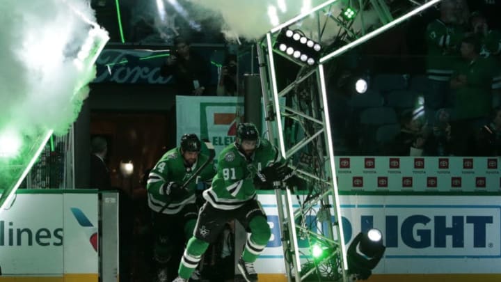 DALLAS, TX - DECEMBER 31: Tyler Seguin #91 and Jamie Benn #14 of the Dallas Stars skate onto the ice against the Montreal Canadiens at the American Airlines Center on December 31, 2018 in Dallas, Texas. (Photo by Glenn James/NHLI via Getty Images)