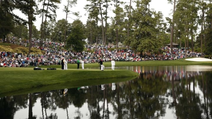 Apr 6, 2016; Augusta, GA, USA; Jack Nicklaus , Gary Player and Tom Watson on the 9th green during the Par 3 Contest prior to the 2016 The Masters golf tournament at Augusta National Golf Club. Mandatory Credit: Rob Schumacher-USA TODAY Sports