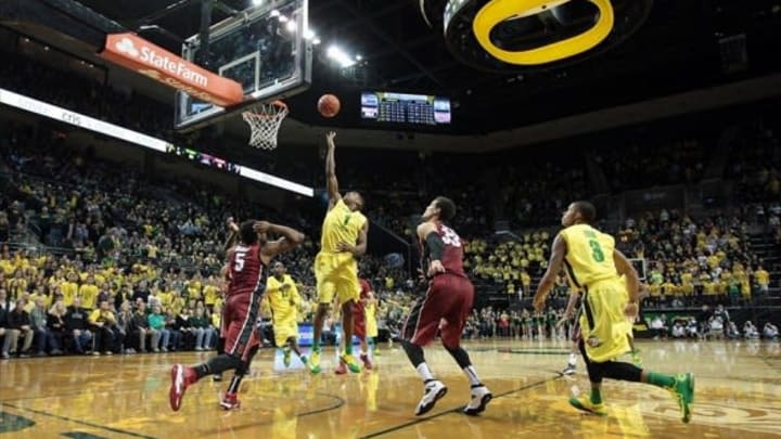 Jan 12, 2014; Eugene, OR, USA; Oregon Ducks guard Dominic Artis (1) shoots and misses a jump shot with 1.8 seconds left against the Stanford Cardinal wins at Matthew Knight Arena. Mandatory Credit: Scott Olmos-USA TODAY Sports