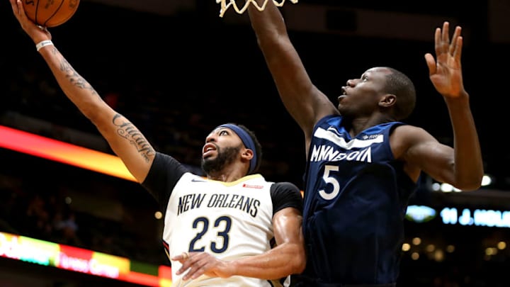 NEW ORLEANS, LA - NOVEMBER 01: Anthony Davis #23 of the New Orleans Pelicans shoots over Gorgui Dieng #5 of the Minnesota Timberwolves during the first half at the Smoothie King Center on November 1, 2017 in New Orleans, Louisiana. NOTE TO USER: User expressly acknowledges and agrees that, by downloading and or using this photograph, User is consenting to the terms and conditions of the Getty Images License Agreement. (Photo by Sean Gardner/Getty Images)