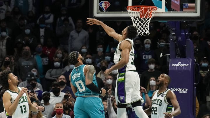 Jan 10, 2022; Charlotte, North Carolina, USA; Milwaukee Bucks forward Giannis Antetokounmpo (34) unable to block a shot by Charlotte Hornets forward Miles Bridges (0) during the second half at the Spectrum Center. Mandatory Credit: Jim Dedmon-USA TODAY Sports Jan 10, 2022; Charlotte, North Carolina, USA; Milwaukee Bucks forward Giannis Antetokounmpo (34) unable to block a shot by Charlotte Hornets forward Miles Bridges (0) during the second half at the Spectrum Center. Mandatory Credit: Jim Dedmon-USA TODAY Sports