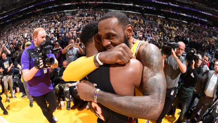LOS ANGELES, CA - DECEMBER 10: Dwyane Wade #3 of the Miami Heat hugs LeBron James #23 of the Los Angeles Lakers after the game on December 10, 2018 at STAPLES Center in Los Angeles, California. NOTE TO USER: User expressly acknowledges and agrees that, by downloading and/or using this Photograph, user is consenting to the terms and conditions of the Getty Images License Agreement. Mandatory Copyright Notice: Copyright 2018 NBAE (Photo by Andrew D. Bernstein/NBAE via Getty Images)