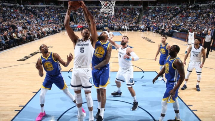 MEMPHIS, TN - MARCH 27: Bruno Caboclo #5 of the Memphis Grizzlies shoots contested shot in the paint against the Golden State Warriors on March 27, 2019 at FedExForum in Memphis, Tennessee. NOTE TO USER: User expressly acknowledges and agrees that, by downloading and or using this photograph, User is consenting to the terms and conditions of the Getty Images License Agreement. Mandatory Copyright Notice: Copyright 2019 NBAE (Photo by Joe Murphy/NBAE via Getty Images)
