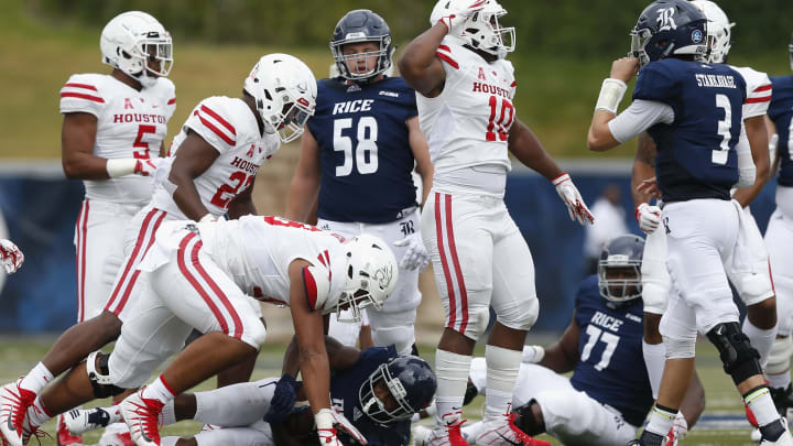 HOUSTON, TX – SEPTEMBER 01: Ed Oliver #10 of the Houston Cougars celebrates after the tackle of Austin Walter #2 of the Rice Owls in the first half at Rice Stadium on September 1, 2018 in Houston, Texas. (Photo by Tim Warner/Getty Images)