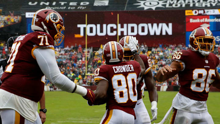 LANDOVER, MD - SEPTEMBER 23: Jamison Crowder #80 of the Washington Redskins celebrates with Jeremy Sprinkle #87 after a touchdown in the second quarter against the Green Bay Packers at FedExField on September 23, 2018 in Landover, Maryland. (Photo by Todd Olszewski/Getty Images)