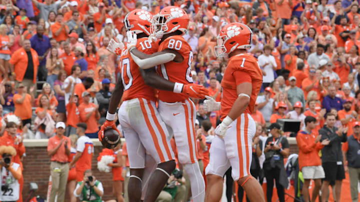 Sep 10, 2022; Clemson, South Carolina, USA; Clemson Tigers wide receiver Joseph Ngata (10) celebrates with wide receiver Beaux Collins (80) after scoring a touchdown against the Furman Paladins during the first quarter at Memorial Stadium. Mandatory Credit: Ken Ruinard-USA TODAY Sports