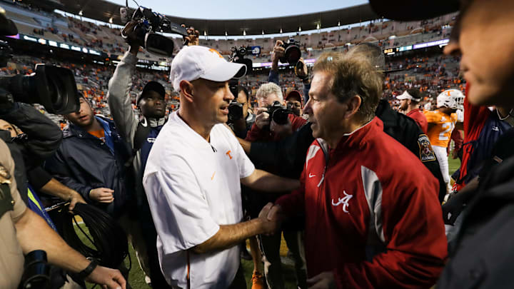 KNOXVILLE, TN – OCTOBER 20: Head Coach Jeremy Pruitt of the Tennessee Volunteers and head coach Nick Saban of the Alabama Crimson Tide shake hands after the second half of the game between the Alabama Crimson Tide and the Tennessee Volunteers at Neyland Stadium on October 20, 2018 in Knoxville, Tennessee. Alabama won 58-21. (Photo by Donald Page/Getty Images)