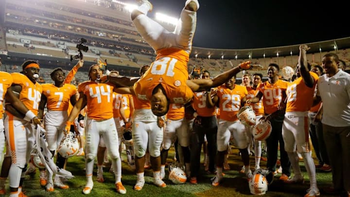 KNOXVILLE, TN - NOVEMBER 04: Nigel Warrior #18 of the Tennessee Volunteers does a flip while celebrating after defeating the Southern Miss Golden Eagles at Neyland Stadium on November 4, 2017 in Knoxville, Tennessee. (Photo by Michael Reaves/Getty Images)