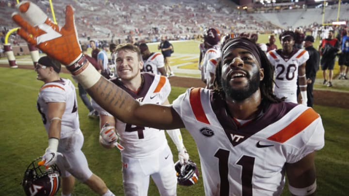 TALLAHASSEE, FL - SEPTEMBER 03: Houshun Gaines #11 of the Virginia Tech Hokies celebrates after the game against the Florida State Seminoles at Doak Campbell Stadium on September 3, 2018 in Tallahassee, Florida. Virginia Tech won 24-3. (Photo by Joe Robbins/Getty Images)
