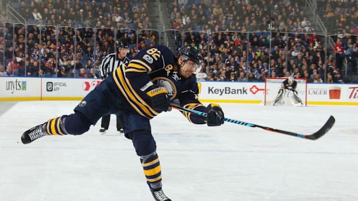 BUFFALO, NY - MARCH 04: Marcus Foligno #82 of the Buffalo Sabres fires a first period shot against the Tampa Bay Lightning during an NHL game at the KeyBank Center on March 4, 2017 in Buffalo, New York. (Photo by Bill Wippert/NHLI via Getty Images)