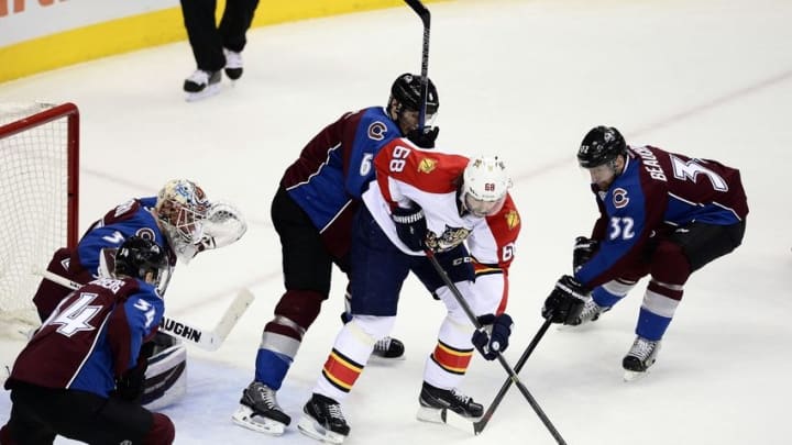 Mar 3, 2016; Denver, CO, USA; Florida Panthers right wing Jaromir Jagr (68) is defended on during a power play by Colorado Avalanche center Carl Soderberg (34) and goalie Calvin Pickard (31) and defenseman Erik Johnson (6) and defenseman Francois Beauchemin (32) in the second period at the Pepsi Center. Mandatory Credit: Ron Chenoy-USA TODAY Sports