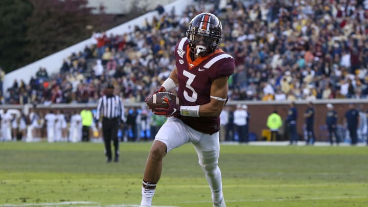 Nov 16, 2019; Atlanta, GA, USA; Virginia Tech Hokies defensive back Caleb Farley (3) returns an interception for a touchdown against the Georgia Tech Yellow Jackets in the second quarter at Bobby Dodd Stadium. Mandatory Credit: Brett Davis-USA TODAY Sports