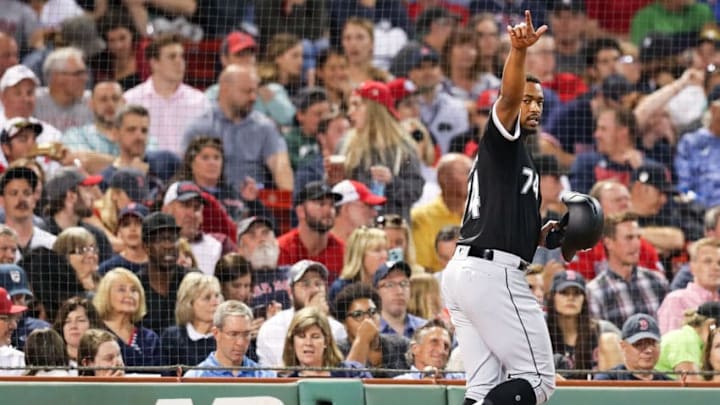 BOSTON, MA - JUNE 24: Eloy Jimenez #74 of the Chicago White Sox points at Yonder Alonso #17 of the Chicago White Sox as he returns to the dugout after scoiring in the seventh inning of a game against the Boston Red Sox at Fenway Park on June 24, 2019 in Boston, Massachusetts. (Photo by Adam Glanzman/Getty Images)