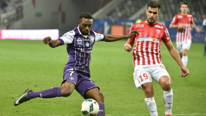 Toulouse’s forward Jean-Daniel Akpa Akpro (L) shoots the ball during the French L1 football match, Toulouse against Nancy, on December 17, 2016, at the Municipal Stadium in Toulouse, southern France. / AFP / REMY GABALDA (Photo credit should read REMY GABALDA/AFP/Getty Images)