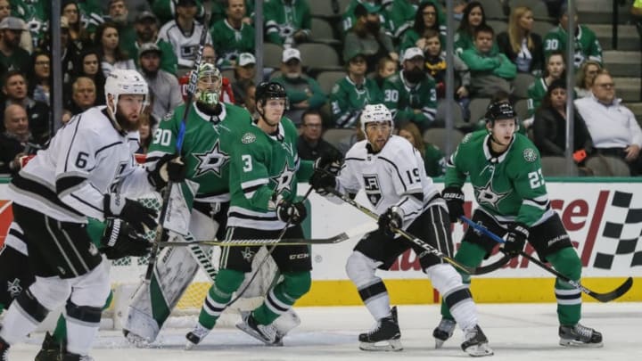 DALLAS, TX - OCTOBER 23: Dallas Stars defenseman John Klingberg (3), defenseman Esa Lindell (23) and Los Angeles Kings left wing Alex Iafallo (19) battle for position in front of Dallas Stars goaltender Ben Bishop (30) during the game between the Dallas Stars and the Los Angeles Kings on October 23, 2018 at the American Airlines Center in Dallas, Texas. (Photo by Matthew Pearce/Icon Sportswire via Getty Images)