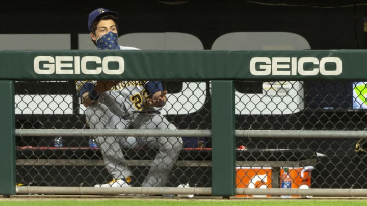 CHICAGO - AUGUST 05: Christian Yelich #22 of the Milwaukee Brewers looks on while wearing a mask against the Chicago White Sox on August 5, 2020 at Guaranteed Rate Field in Chicago, Illinois. (Photo by Ron Vesely/Getty Images)