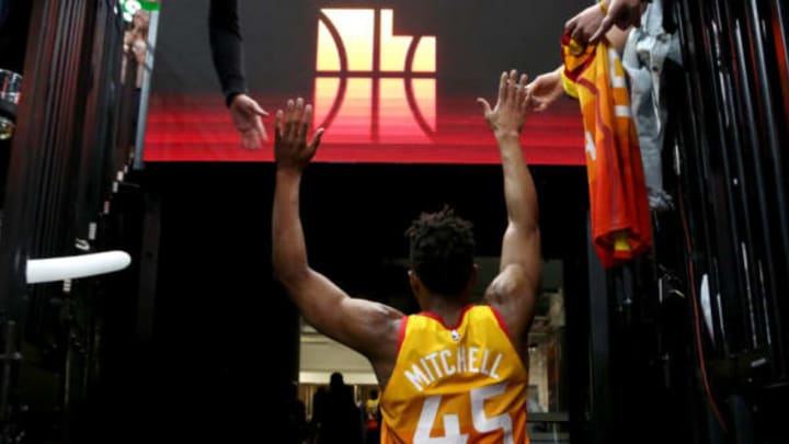 SALT LAKE CITY, UT – MARCH 2: Donovan Mitchell #45 of the Utah Jazz high fives fans after the game against the Minnesota Timberwolves on March 2, 2018 at vivint.SmartHome Arena in Salt Lake City, Utah. NOTE TO USER: User expressly acknowledges and agrees that, by downloading and or using this Photograph, User is consenting to the terms and conditions of the Getty Images License Agreement. Mandatory Copyright Notice: Copyright 2018 NBAE (Photo by Melissa Majchrzak/NBAE via Getty Images)