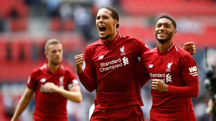 LONDON, ENGLAND - SEPTEMBER 15: Virgil van Dijk of Liverpool and team mate Joe Gomez celebrate following the Premier League match between Tottenham Hotspur and Liverpool FC at Wembley Stadium on September 15, 2018 in London, United Kingdom. (Photo by Julian Finney/Getty Images)