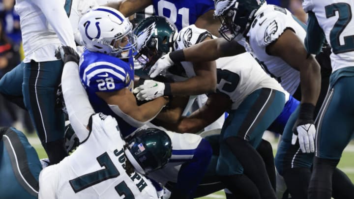 INDIANAPOLIS, INDIANA - NOVEMBER 20: Jonathan Taylor #28 of the Indianapolis Colts runs past C.J. Gardner-Johnson #23 of the Philadelphia Eagles while scoring a touchdown during the first quarter at Lucas Oil Stadium on November 20, 2022 in Indianapolis, Indiana. (Photo by Justin Casterline/Getty Images)