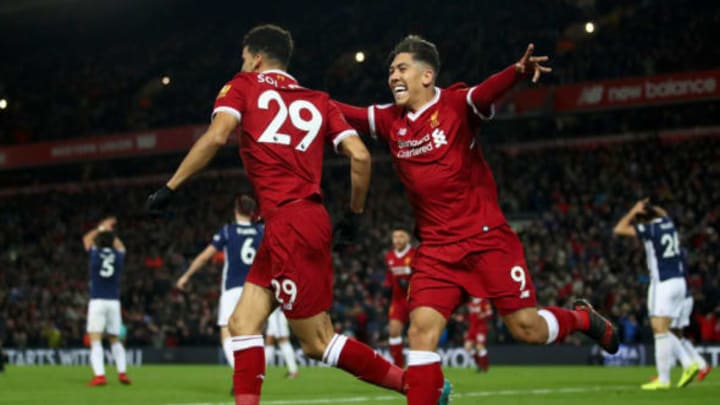 LIVERPOOL, ENGLAND – DECEMBER 13: Dominic Solanke of Liverpool celebrates after scoring his sides first goal with Roberto Firmino of Liverpool but it is later disallowed during the Premier League match between Liverpool and West Bromwich Albion at Anfield on December 13, 2017 in Liverpool, England. (Photo by Clive Brunskill/Getty Images)