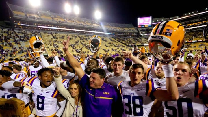 Oct 22, 2016; Baton Rouge, LA, USA; LSU Tigers head coach Ed Orgeron celebrates with his team following a win against the Mississippi Rebels in a game at Tiger Stadium. LSU defeated Mississippi 38-21. Mandatory Credit: Derick E. Hingle-USA TODAY Sports