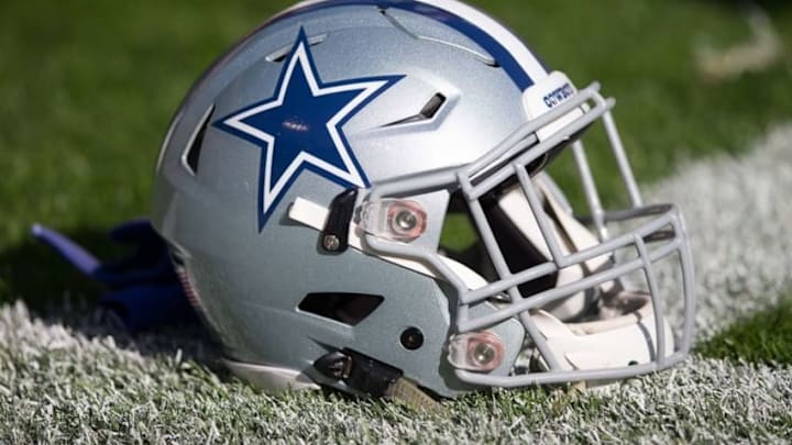 Oct 16, 2016; Green Bay, WI, USA; A Dallas Cowboys helmet sits on the field prior to the game against the Green Bay Packers at Lambeau Field. Dallas won 30-16. Mandatory Credit: Jeff Hanisch-USA TODAY Sports