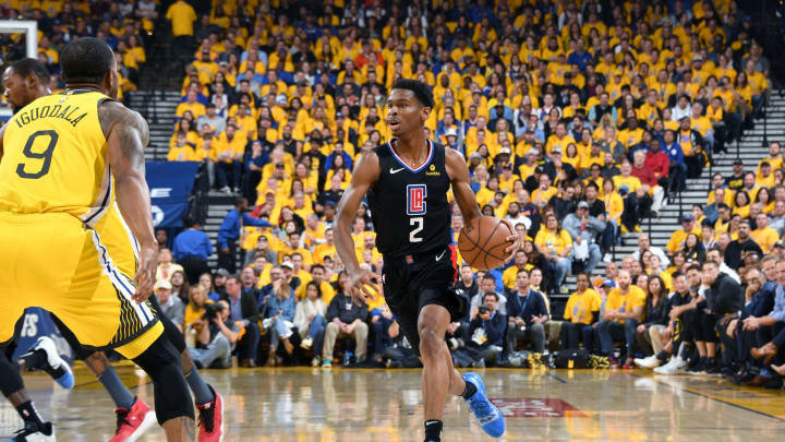 OAKLAND, CA – APRIL 15: Shai Gilgeous-Alexander #2 of the LA Clippers handles the ball against the Golden State Warriors in Game Two of Round One during the 2019 NBA Playoffs on April 15, 2019 at ORACLE Arena in Oakland, California. NOTE TO USER: User expressly acknowledges and agrees that, by downloading and/or using this photograph, user is consenting to the terms and conditions of Getty Images License Agreement. Mandatory Copyright Notice: Copyright 2019 NBAE (Photo by Andrew D. Bernstein/NBAE via Getty Images)