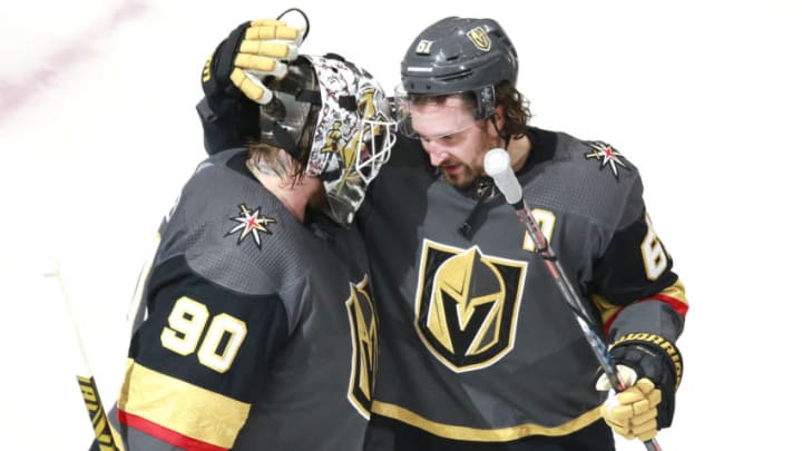 Robin Lehner #90 of the Vegas Golden Knights is congratulated by teammate Mark Stone #61 after they defeated the Dallas Stars 5-2 in a Western Conference Round Robin game. (Photo by Jeff Vinnick/Getty Images)