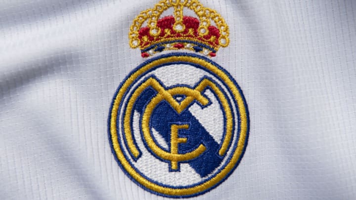 MANCHESTER, ENGLAND - JULY 19: The Real Madrid club crest on the first team home shirt on July 19, 2020 in Manchester, United Kingdom. (Photo by Visionhaus)