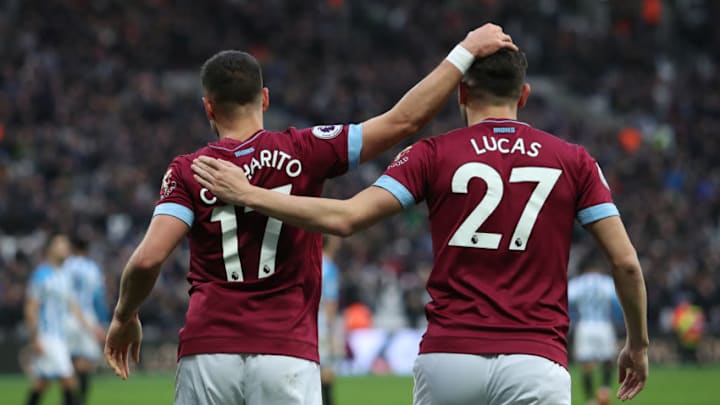 LONDON, ENGLAND - MARCH 16: Javier Hernandez of West Ham United and Lucas Perez celebrates their winning goal during the Premier League match between West Ham United and Huddersfield Town at London Stadium on March 16, 2019 in London, United Kingdom. (Photo by Christopher Lee/Getty Images)