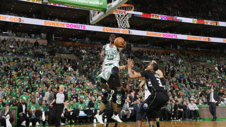 BOSTON, MA - APRIL 15: Terry Rozier #12 of the Boston Celtics goes to the basket against the Milwaukee Bucks in Game One of Round One during the 2018 NBA Playoffs on April 15, 2018 at TD Garden in Boston, Massachusetts. NOTE TO USER: User expressly acknowledges and agrees that, by downloading and or using this photograph, user is consenting to the terms and conditions of Getty Images License Agreement. Mandatory Copyright Notice: Copyright 2018 NBAE (Photo by Brian Babineau/NBAE via Getty Images)