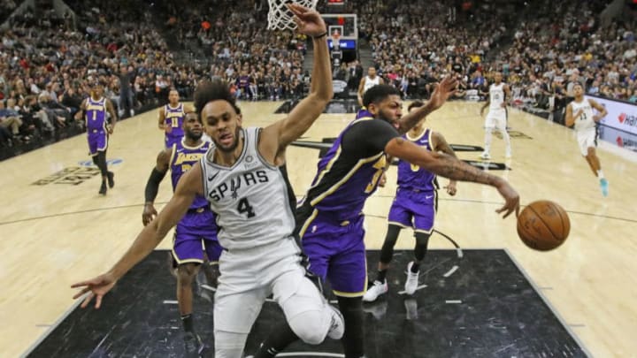 SAN ANTONIO,TX - NOVEMBER 03: Anthony Davis #3 of the Los Angeles Lakers blocks shot attempt of Derrick White #4 of the San Antonio Spurs at AT&T Center on November 03, 2019 in San Antonio, Texas. NOTE TO USER: User expressly acknowledges and agrees that , by downloading and or using this photograph, User is consenting to the terms and conditions of the Getty Images License Agreement. (Photo by Ronald Cortes/Getty Images)