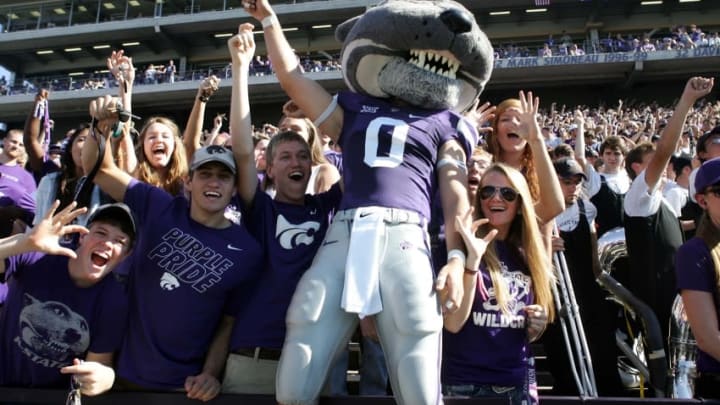 Oct 25, 2014; Manhattan, KS, USA; Kansas State Wildcats mascot Willie Wildcat celebrates with fans during a 23-0 win against the Texas Longhorns at Bill Snyder Family Stadium. Mandatory Credit: Scott Sewell-USA TODAY Sports