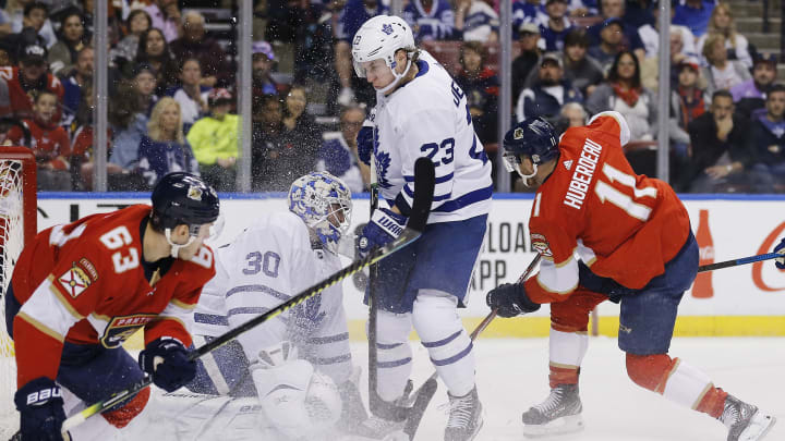 SUNRISE, FLORIDA – JANUARY 12: Jonathan Huberdeau #11 of the Florida Panthers scores a goal past goalie Michael Hutchinson #30 of the Toronto Maple Leafs. (Photo by Michael Reaves/Getty Images)