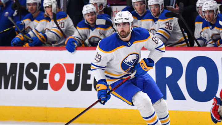 MONTREAL, QC - FEBRUARY 13: Alex Tuch #89 of the Buffalo Sabres skates the puck against the Montreal Canadiens during the first period at Centre Bell on February 13, 2022 in Montreal, Canada. The Buffalo Sabres defeated the Montreal Canadiens 5-3. (Photo by Minas Panagiotakis/Getty Images)