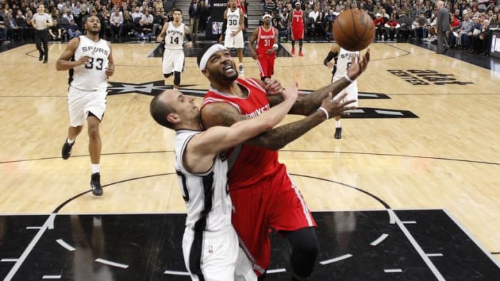 Jan 27, 2016; San Antonio, TX, USA; Houston Rockets center Josh Smith (5, right) is fouled while shooting by San Antonio Spurs shooting guard Manu Ginobili (20, left) during the first half at AT&T Center. Mandatory Credit: Soobum Im-USA TODAY Sports