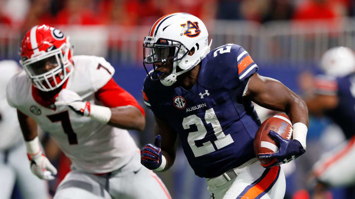 ATLANTA, GA – DECEMBER 02: Kerryon Johnson #21 of the Auburn Tigers runs the ball during the first half against the Georgia Bulldogs in the SEC Championship at Mercedes-Benz Stadium on December 2, 2017 in Atlanta, Georgia. (Photo by Kevin C. Cox/Getty Images)