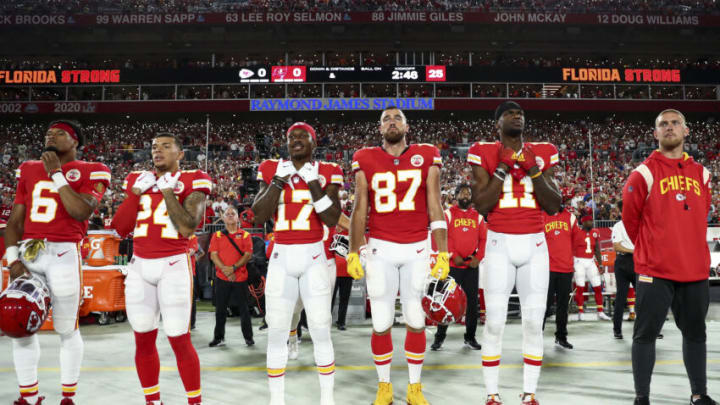 TAMPA, FL - OCTOBER 2: Bryan Cook #6, Skyy Moore #24, Mecole Hardman #17, Travis Kelce #87, and Marquez Valdes-Scantling #11 of the Kansas City Chiefs stand during the national anthem prior to an NFL football game against the Tampa Bay Buccaneers at Raymond James Stadium on October 2, 2022 in Tampa, Florida. (Photo by Kevin Sabitus/Getty Images)