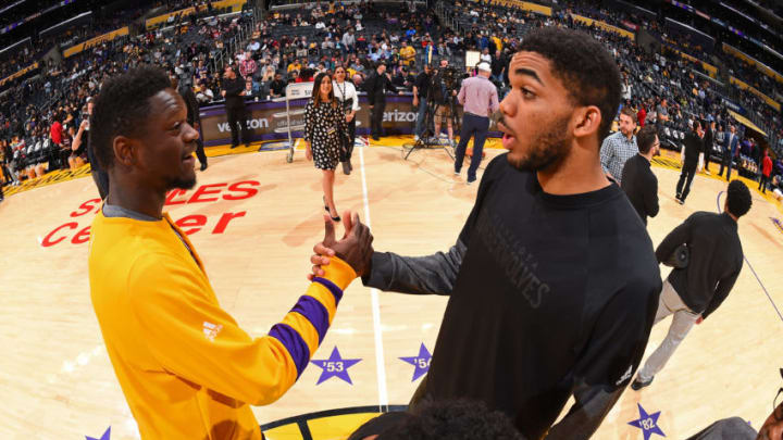 LOS ANGELES, CA - MARCH 24: Julius Randle #30 of the Los Angeles Lakers shakes hands with Karl-Anthony Towns #32 of the Minnesota Timberwolves before the game on March 24, 2017 at STAPLES Center in Los Angeles, California. NOTE TO USER: User expressly acknowledges and agrees that, by downloading and/or using this Photograph, user is consenting to the terms and conditions of the Getty Images License Agreement. Mandatory Copyright Notice: Copyright 2017 NBAE (Photo by Andrew D. Bernstein/NBAE via Getty Images)