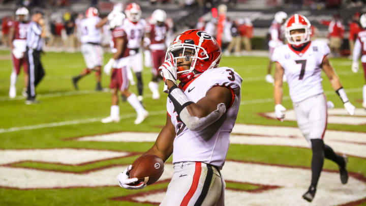 Nov 28, 2020; Columbia, South Carolina, USA; Georgia Bulldogs running back Zamir White (3) celebrates a touchdown against the South Carolina Gamecocks during the first quarter at Williams-Brice Stadium. Mandatory Credit: Jeff Blake-USA TODAY