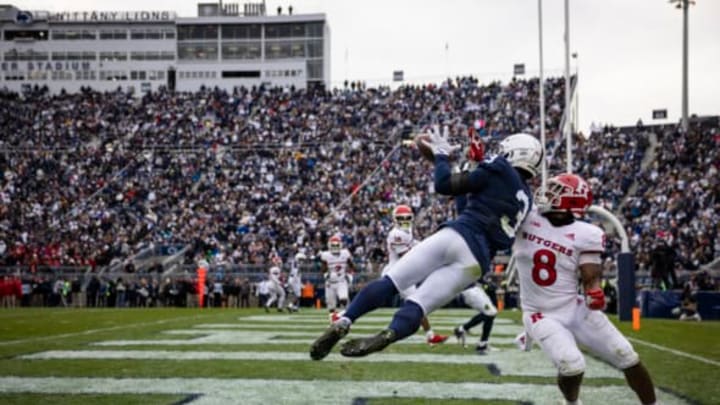 STATE COLLEGE, PA – NOVEMBER 20: Parker Washington #3 of the Penn State Nittany Lions catches a pass for a touchdown against Tyshon Fogg #8 of the Rutgers Scarlet Knights during the second half at Beaver Stadium on November 20, 2021 in State College, Pennsylvania. (Photo by Scott Taetsch/Getty Images)