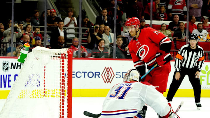RALEIGH, NC - OCTOBER 3: Dougie Hamilton #19 of the Carolina Hurricanes scores a goal in a shoot out past goaltender Carey Price #31 of the Montreal Canadiens during an NHL game on October 3, 2019 at PNC Arena in Raleigh North Carolina. (Photo by Gregg Forwerck/NHLI via Getty Images)
