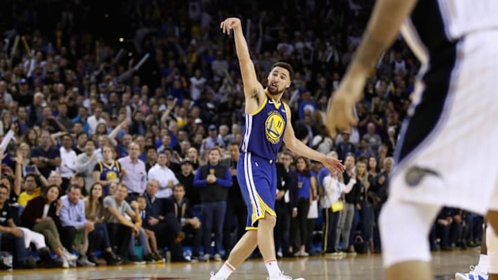 OAKLAND, CA - NOVEMBER 26: Klay Thompson #11 of the Golden State Warriors watches a shot during their game against the Orlando Magic at ORACLE Arena on November 26, 2018 in Oakland, California. NOTE TO USER: User expressly acknowledges and agrees that, by downloading and or using this photograph, User is consenting to the terms and conditions of the Getty Images License Agreement. (Photo by Ezra Shaw/Getty Images)