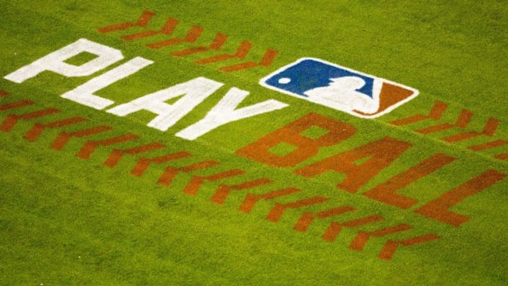 May 13, 2016; Philadelphia, PA, USA; An MLB play ball logo painted on the grass at Citizens Bank Park during a game between the Philadelphia Phillies and the Cincinnati Reds. The Philadelphia Phillies won 3-2. Mandatory Credit: Bill Streicher-USA TODAY Sports