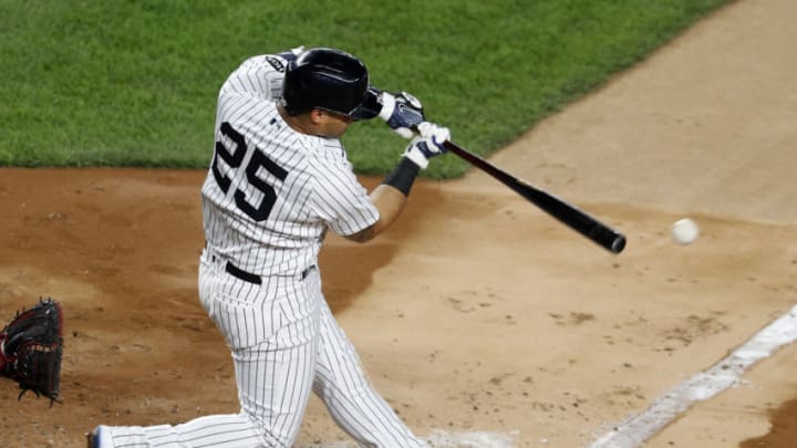 NEW YORK, NEW YORK - AUGUST 14: (NEW YORK DAILIES OUT) Gleyber Torres #25 of the New York Yankees connects on a fifth inning single against the Boston Red Sox at Yankee Stadium on August 14, 2020 in New York City. The Yankees defeated the Red Sox 10-3. (Photo by Jim McIsaac/Getty Images)