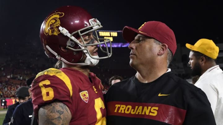 LOS ANGELES, CA - NOVEMBER 24: Head coach Clay Helton of USC Trojans hugs wide receiver Michael Pittman Jr. #6 after they lost to Notre Dame Fighting Irish, 24-17, on November 24, 2018 in Los Angeles, California. (Photo by Kevork Djansezian/Getty Images)