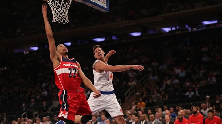 Oct 10, 2016; New York, NY, USA; Washington Wizards forward Otto Porter Jr. (22) shoots the ball as New York Knicks center Willy Hernangomez (14) defends during the first quarter at Madison Square Garden. Mandatory Credit: Anthony Gruppuso-USA TODAY Sports