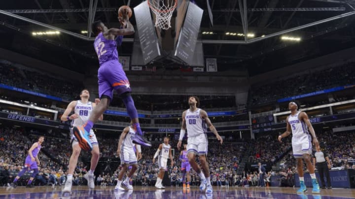 SACRAMENTO, CA - MARCH 23: Deandre Ayton #22 of the Phoenix Suns goes up for the shot against the Sacramento Kings on March 23, 2019 at Golden 1 Center in Sacramento, California. NOTE TO USER: User expressly acknowledges and agrees that, by downloading and or using this photograph, User is consenting to the terms and conditions of the Getty Images Agreement. Mandatory Copyright Notice: Copyright 2019 NBAE (Photo by Rocky Widner/NBAE via Getty Images)